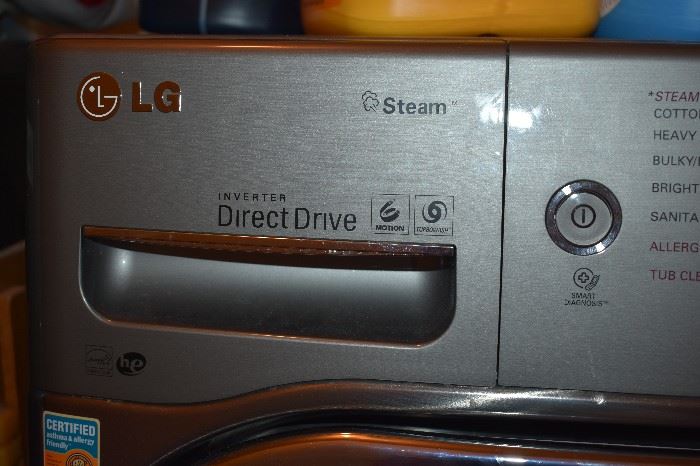 LG Inverter Direct Drive Steam Front Load Washer and Dryer with pedestals.  