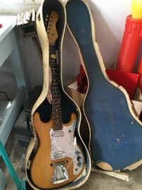 Vintage electric guitar and case