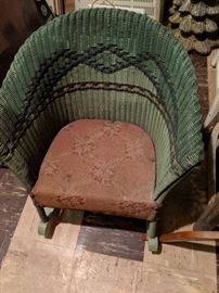 Antique Victorian wicker child's rocker with padded seat