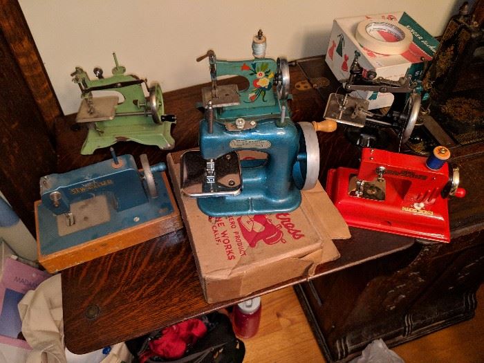 Toy sewing machines and a Singer salesman sample