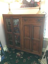 Antique cabinet with storage & display space. 