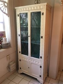 Don't you just love this antique cabinet! Leaded glass doors with tons of character! 