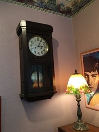 Another clock, lamp , poster. 
