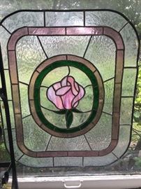 A beautiful piece of stained glass featuring a single rose. The man of the home made beautiful stained glass and we are honored to have numerous pieces included in the sale. 