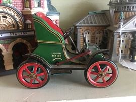 Cute vintage wind up tin toy car