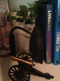 Old iron bookends; cannon