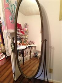 You can see yourself from "top to toe" in this extra sturdy oval floor mirror.