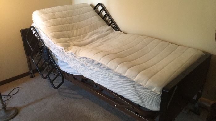 hospital bed with remote and gel mattress