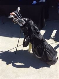 Golf bag with clubs