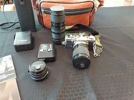 Olympus 35mm camera with 3 lenses