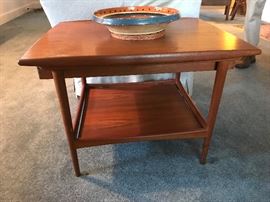 mid century modern end table...the single drawer can be accessed/pulled from either end. 