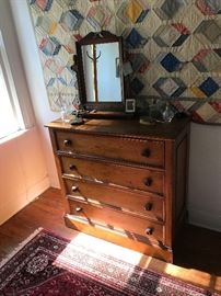 vintage dresser with oak table top mirror and vintage hanging quilt