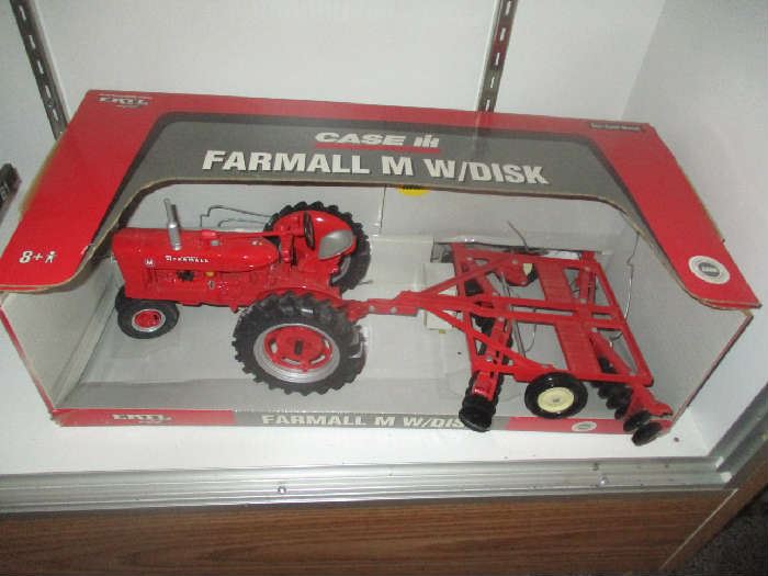 Farmall toy tractor in original box