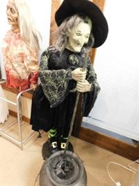 Witch and cauldron animatronic
