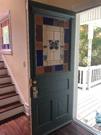 Front door with amazing stained glass and trim