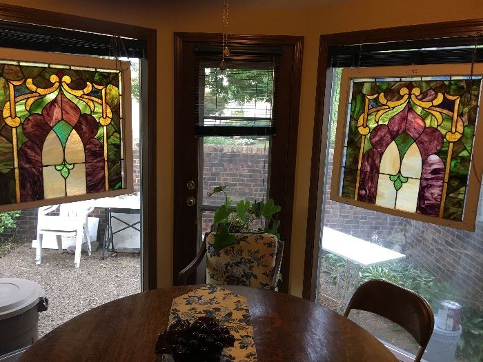 Pair of antique stained glass windows 