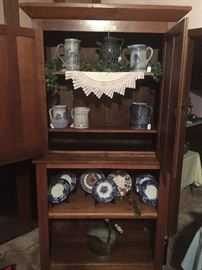 Walnut step back cabinet. Antique pitchers, Flow Blue, more.