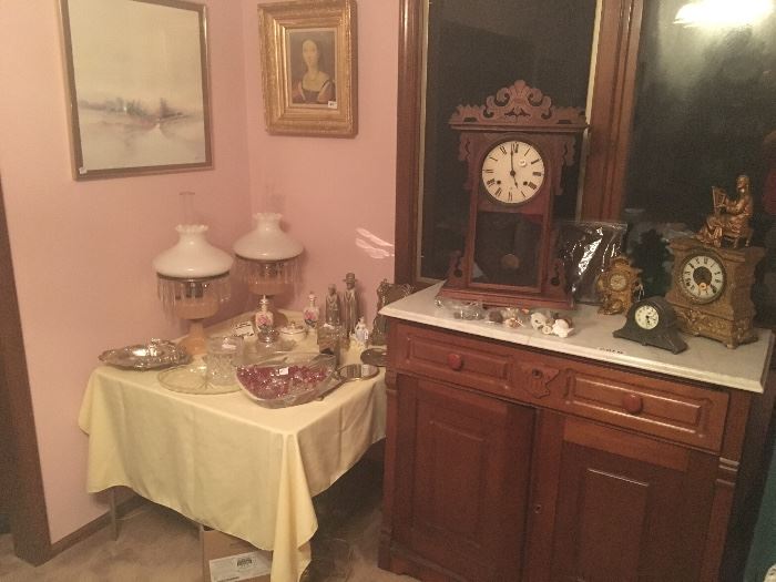 Antique clocks, banquet lamps, more. Sorry marble top buffet not for sale.