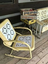1950's metal furniture.  Includes glider, porch swing, and 5 chairs of various colors.