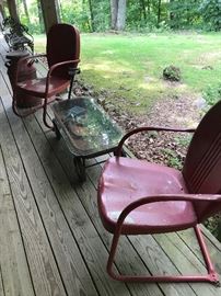 Rusted Radio Flyer wagon used as cool porch table.