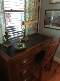 Oak desk and matching chair.  Brass desk lamp, etc.