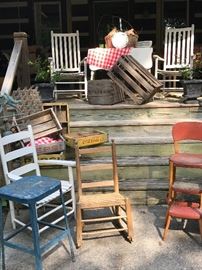 Variety of vintage chairs and rockers.