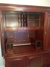 Amazing office desk cabinet. Great for a computer monitor and all the storage space you could possibly need.Just close the doors and it looks like a lovely piece of furniture.