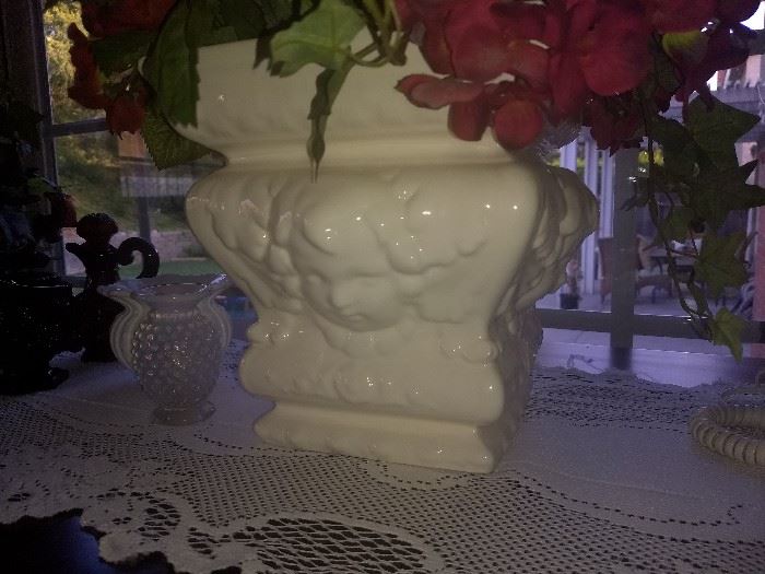 Silk floral arrangements in stunning vintage vases