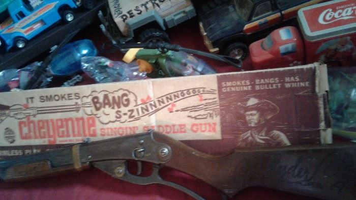 Gun with Box and Red Rider BB gun