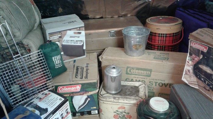 Camping gear-vintage and newer.  Lots of sleeping bags, cook stoves and coolers