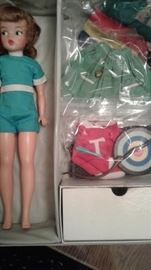 COMPLETE outfits, carrying case and doll-Tammy