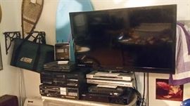 FLAT SCREEN TV ON WALL MOUNT & OTHER ELECTRONICS...2 BLUE MOREY BOOGIE BODY BOARDS