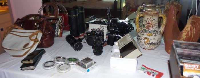35mm camera, lenses and accessories, handbooks, purses, music CDs
