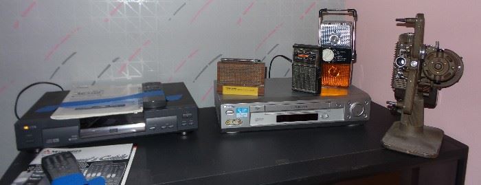 electronics: projection tv, speakers, cd player, dvd player, slide projector, 8mm film projector