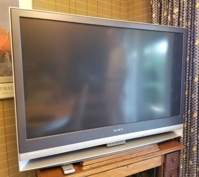 large screen tv.  Not flat (not tube)