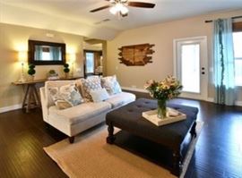 Ashley Furniture Couch & Ottoman, Pottery Barn Mirror, United States Wall Decor is  (not for sale)