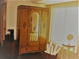 Early 1900's Wardrobe, Small side cabinet, Portable Stereo, Basket of vintage and movie posters, Small table, Mirror