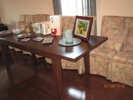 Large Custom Made Dining Table, Eight (8) Upholstered Chairs in floral fabric.