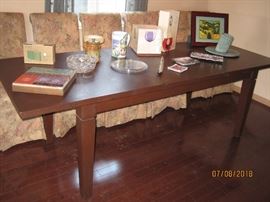 Decorator items, large custom made dining table with eight (8) Upholstered Floral Chairs