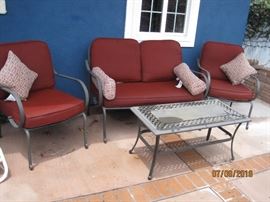Lovely Patio set, 2 chairs, settee and coffee table, cushions too! 
