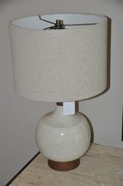 One of a pair of West Elm lamps with ceramic speckled base and acorn trim