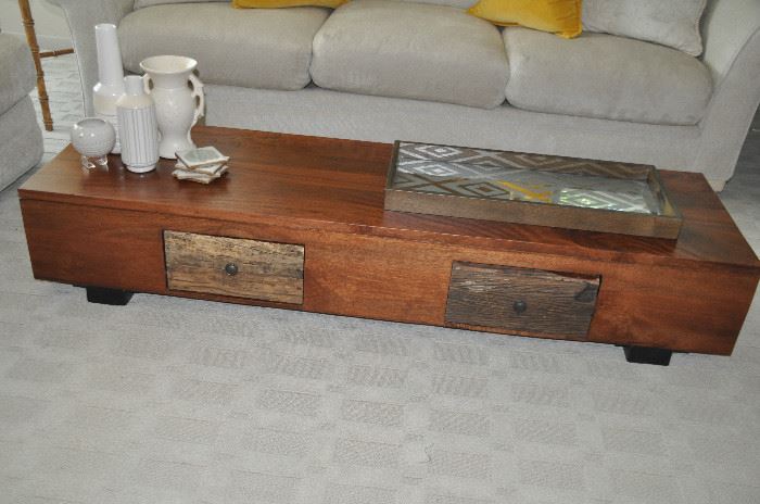 Fantastic rustic low mahogany coffee table with two drawers.  67”w x 12”h x 20” d.