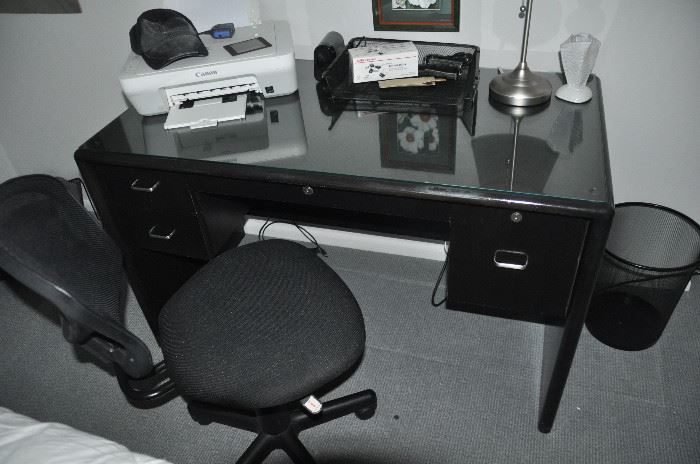 Wonderful heavy black solid wooden desk with glass top and 4 drawers, 47"w x 29"h x 24"d