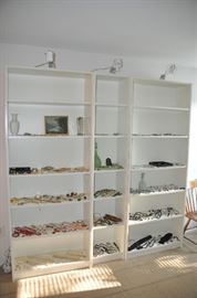 Set of three white Formica bookcases with adjustable shelves 79” high and IKEA spot lights  displaying hundreds of pieces of jewelry!! 