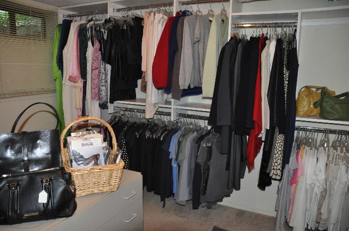 Huge walk in closet filled with better women's clothes, mostly medium and larges