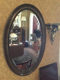 Oval wood mirror with beveled edge