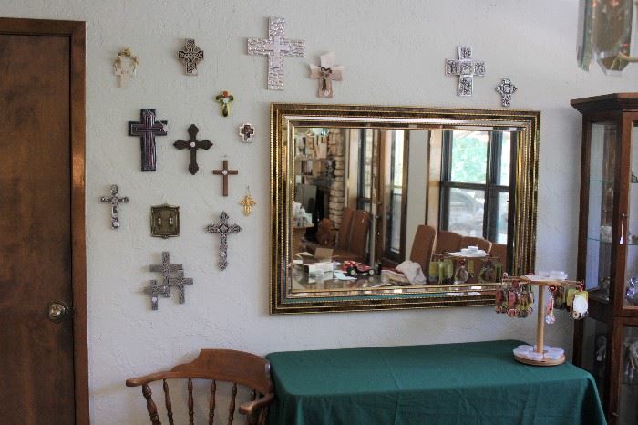 Wall of crosses and wall mirrors
