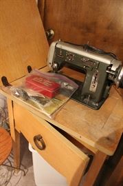 De Luxe Zig Zag vintage sewing machine in cabinet