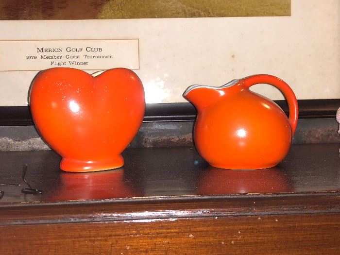 Family Heritage Estate Sales, LLC. New Jersey Estate Sales/ Pennsylvania Estate Sales. Orange Glass Pitcher and Vase.