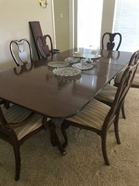 This solid wood table and chairs came from Princeton University Faculty Club in the mid 60's. 